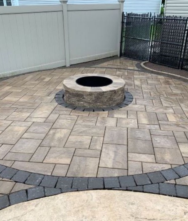 patio with stone fireplace